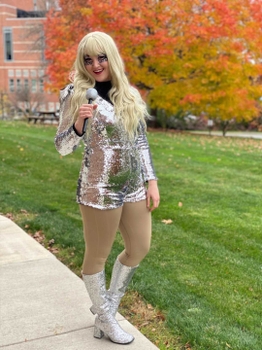 Dr. St. Martin in costume as a rock star