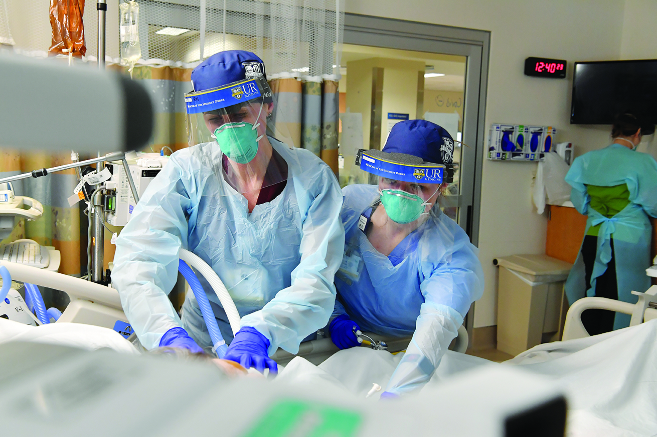 Strong Memorial Hospital staff care for a critically ill COVID patient.