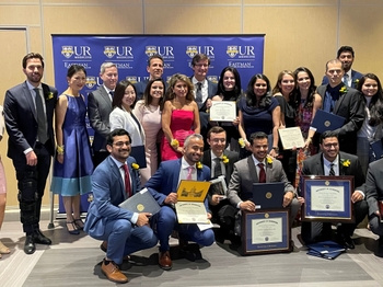 a large group posing for a photo after the ceremony