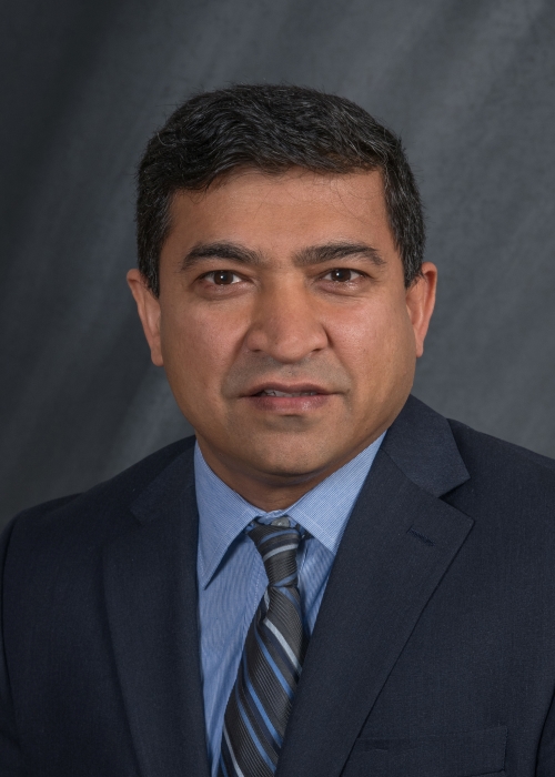 head and shoulders of Dr. Barmak