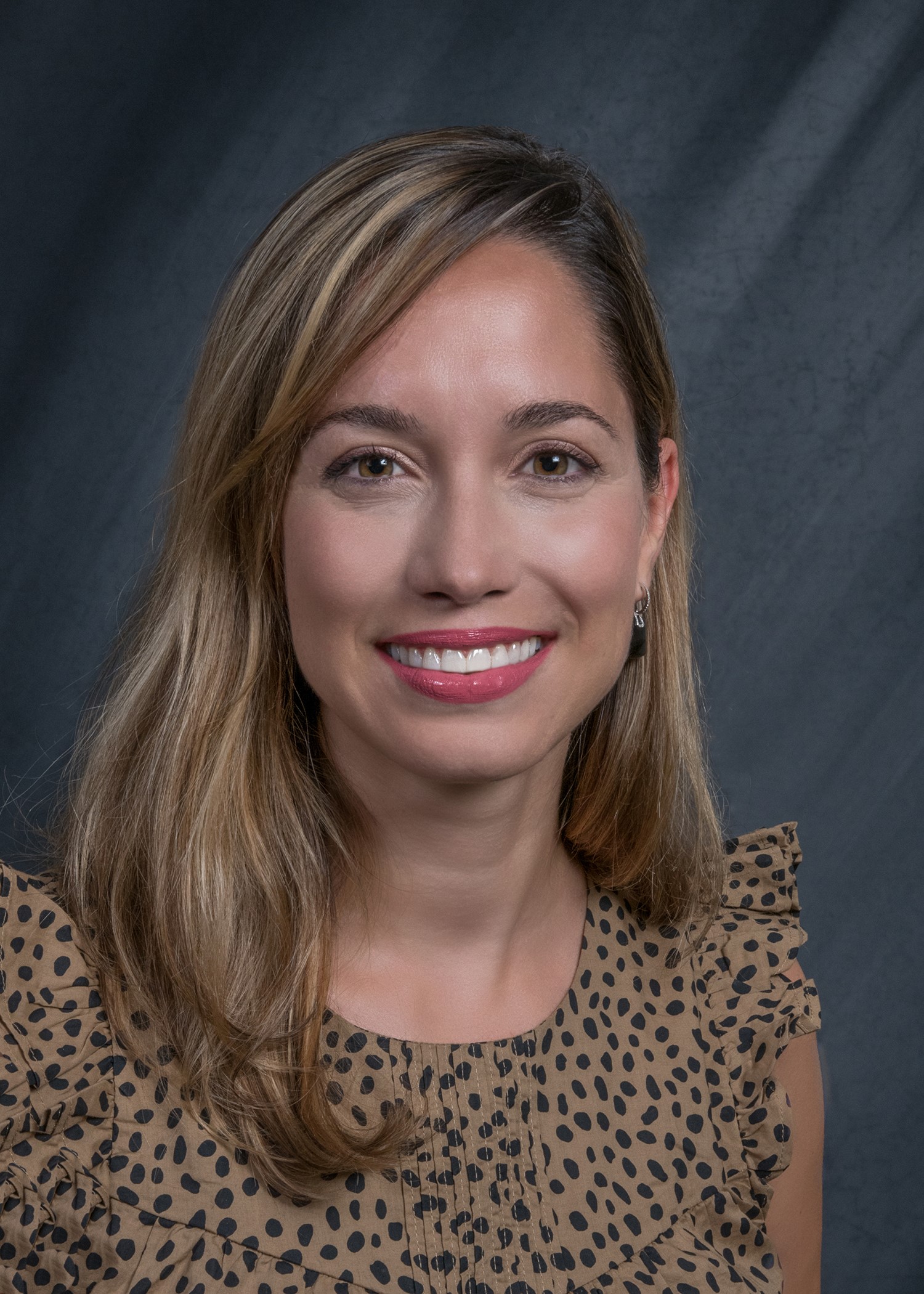 head and shoulders of Dr. Tsigardia