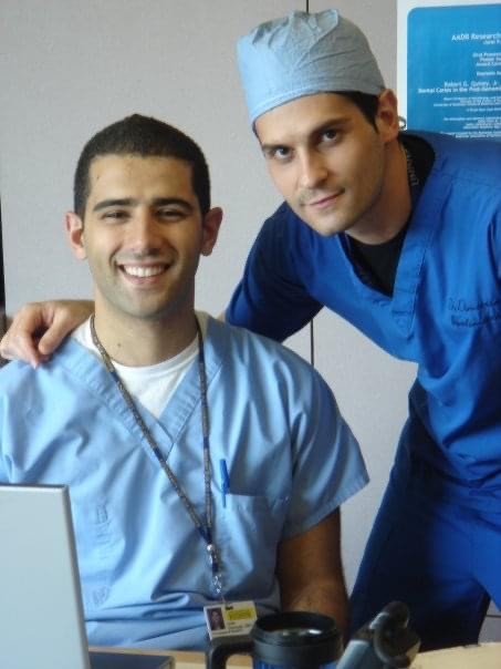 younger versions of the two men in scrubs 