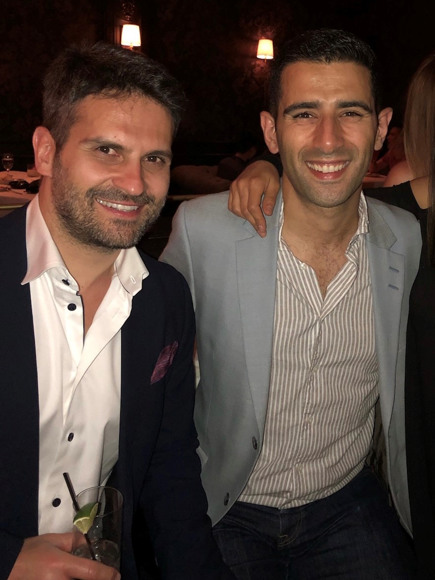 both men smiling at camera