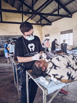 Dr. Benzaquen treating a patient in Uganda