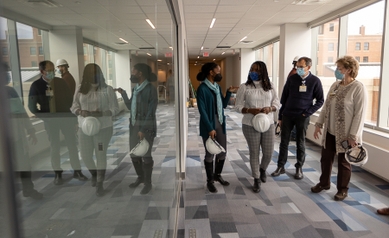 Rideout and faculty touring the new addition to Helen Wood Hall