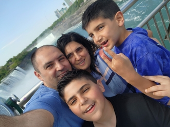 Hala's family taking a selfie in front of Niagara Falls. 