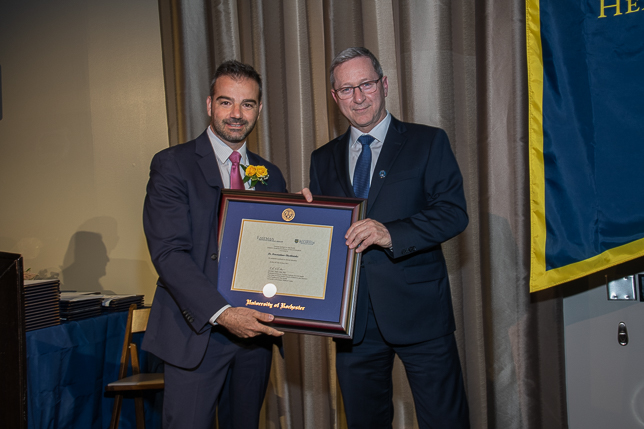 Dr. Chochlidakis receiving the award from Dr. Eliav