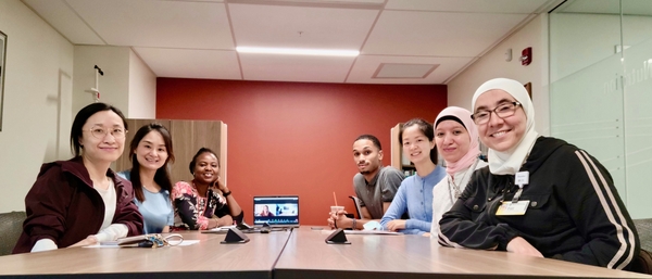The EIOH and RIT study team around a table
