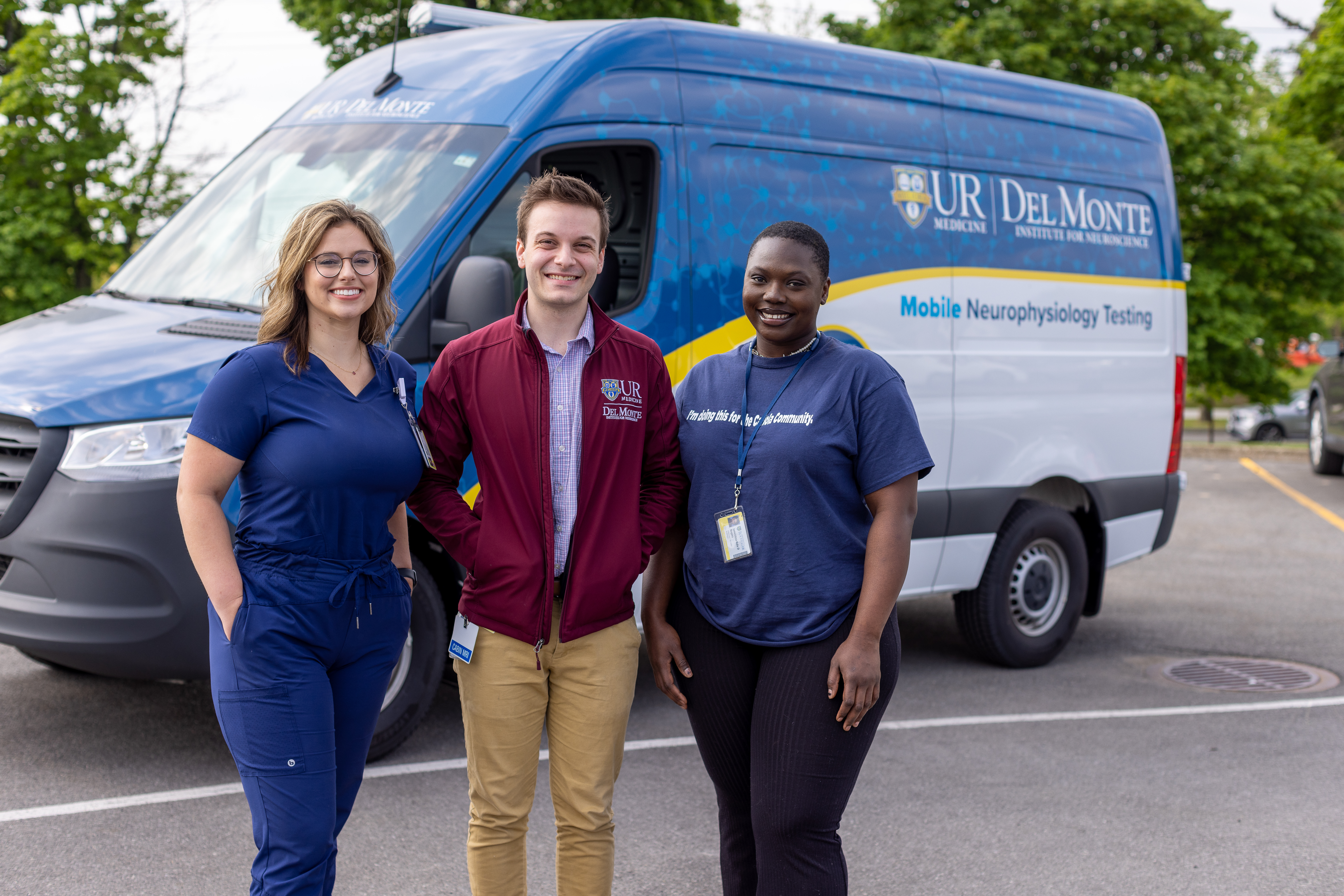 From left: Sam Spallina, Alex Solorzano, and Davida Rogers conducted testing at Mary Cariola. They also used the van, in the background, to provide mobile testing.