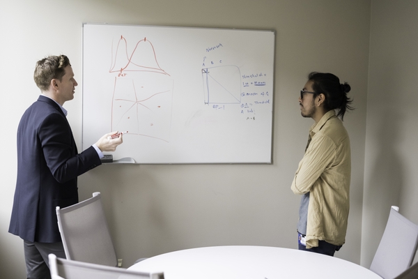 Jose Reynoso (R), lab assistant, works with Assistant Professor Brian Keane in his lab in the Center for Advanced Brain Imaging and Neurophysiology August 29, 2023. Reynoso is an alumnus of NEUROCITY, a Del Monte Institute for Neuroscience Diversity Commission pathway program.