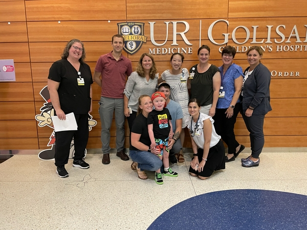  Back from left: Joan Mountain, RN, Sam Mackenzie, MD, PhD, Katy Eichinger, PT, Bo Lee, MD, Amy Luce, NP, Debra Guntrum, NP, Jennifer Sellars, RN. Front from left: Ciera Ottenschot, Kohen Ottenschot, John-Michael Ottenschot, and Heather Romeiser, NP.