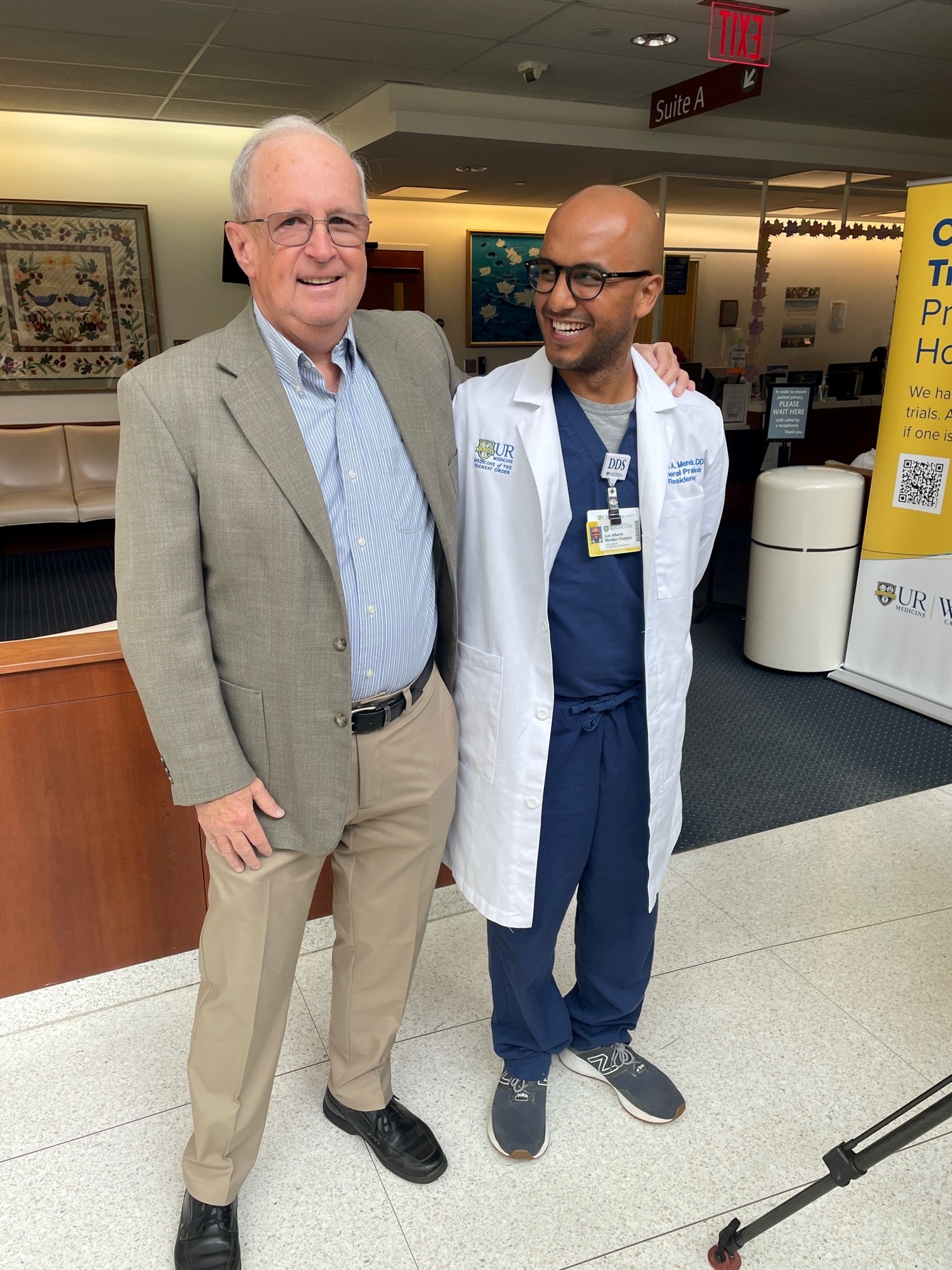 Dr. Mendez and Harley standing and smiling