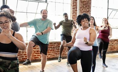 Diverse people in an active dance class