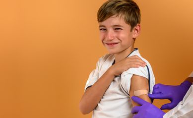 smiling boy after vaccine