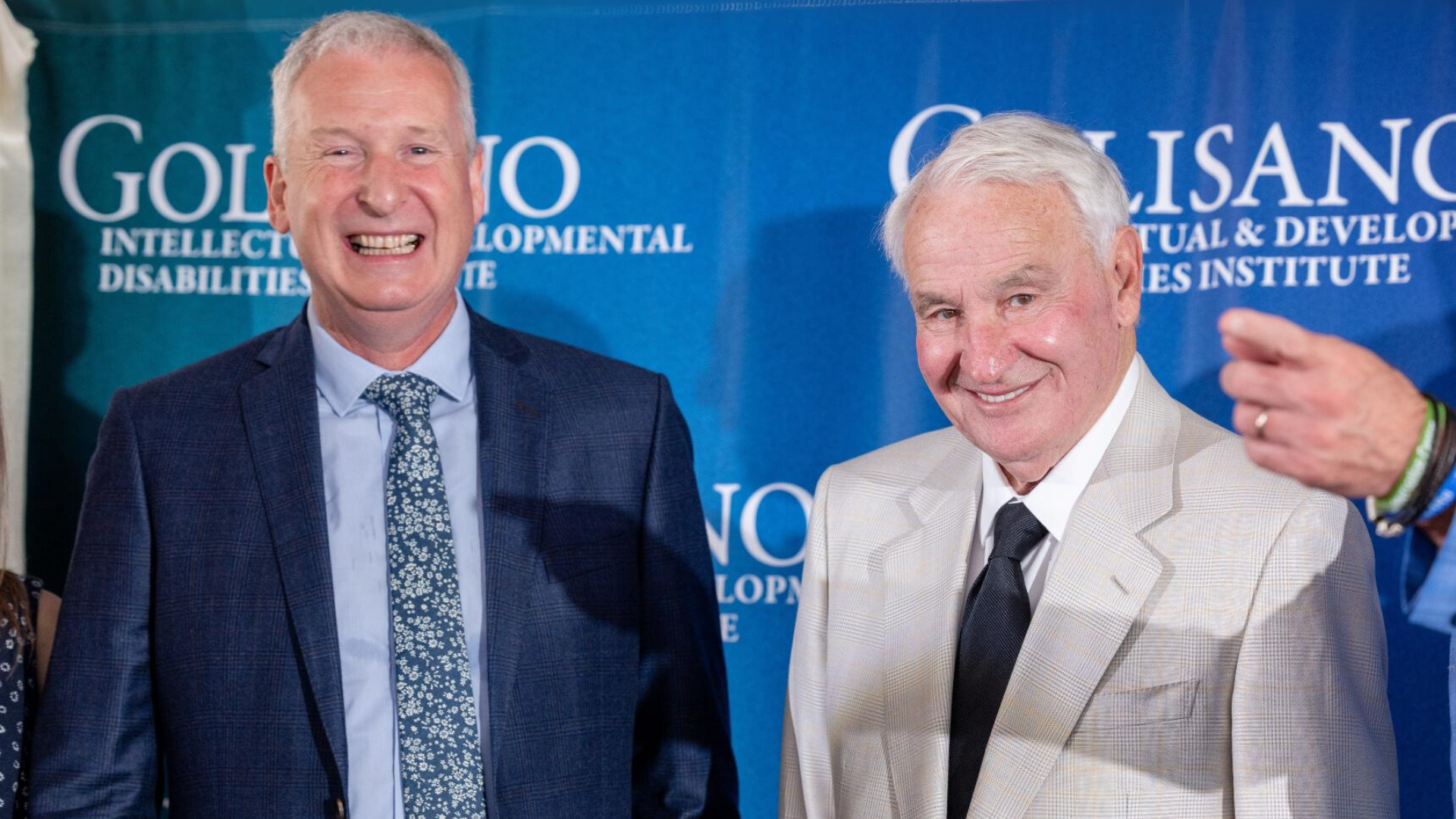 John Foxe and Tom Golisano smile for a photo