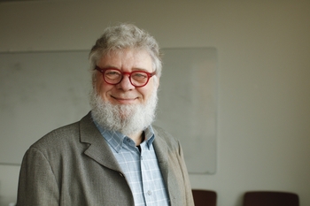 headshot of Hucky Land, PhD, deputy director of Wilmot Cancer Institute