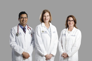 professional photo of three people in white coats who run the cardio-oncology clinic 