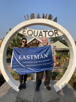 Dr. Torabi and Dr. Barzilay standing in front of Uganda Equator sign