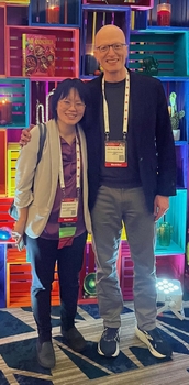 two doctors posing at American Society of Hematology annual meeting 