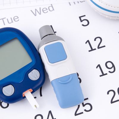 Diabetes, calendar, baby shoes