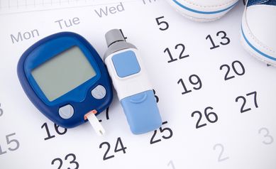 Diabetes, calendar, baby shoes