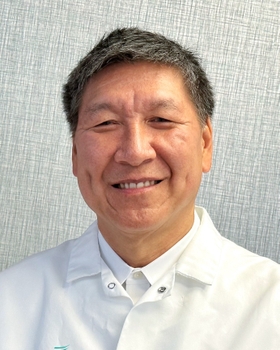 A portrait of Dr. Stephen Chu, smiling.