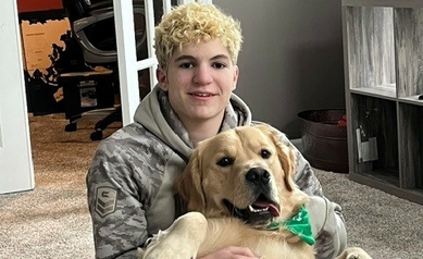 Talon with family dog