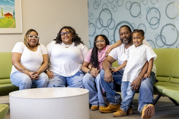 Paige Smith with family during the 2026 Miracle Kids photoshoot