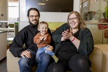 Luke Johnson with his father and mother