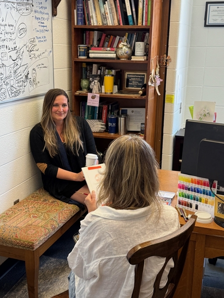 Marissa Sobolewski, PhD, during the sitting in her office with Artist-in-Residence Charmaine Wheatley.
