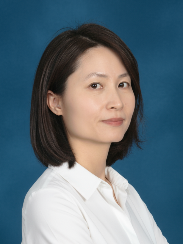 A woman of Asian descent with short dark brown hair.