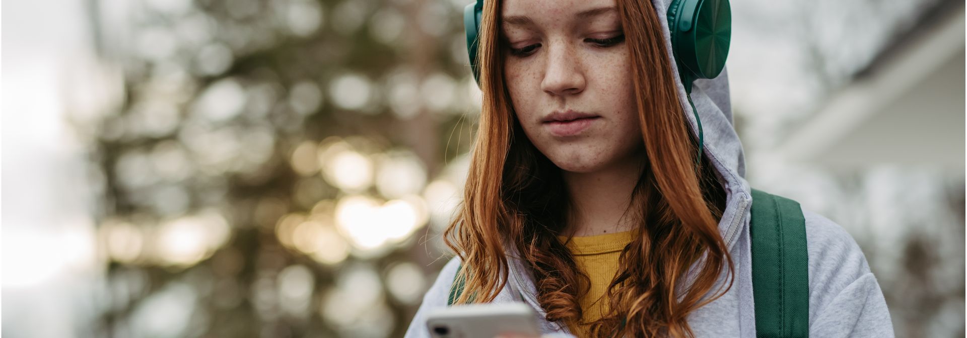 young woman looking at cell phone