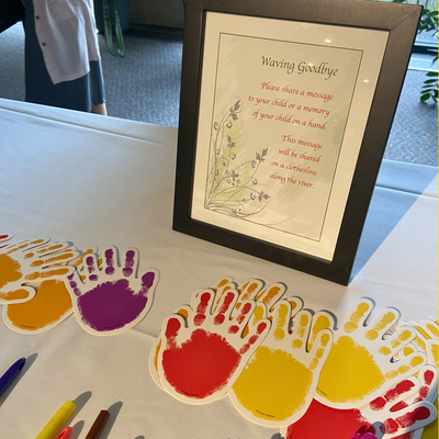 waving goodbye activity at memorial service reception