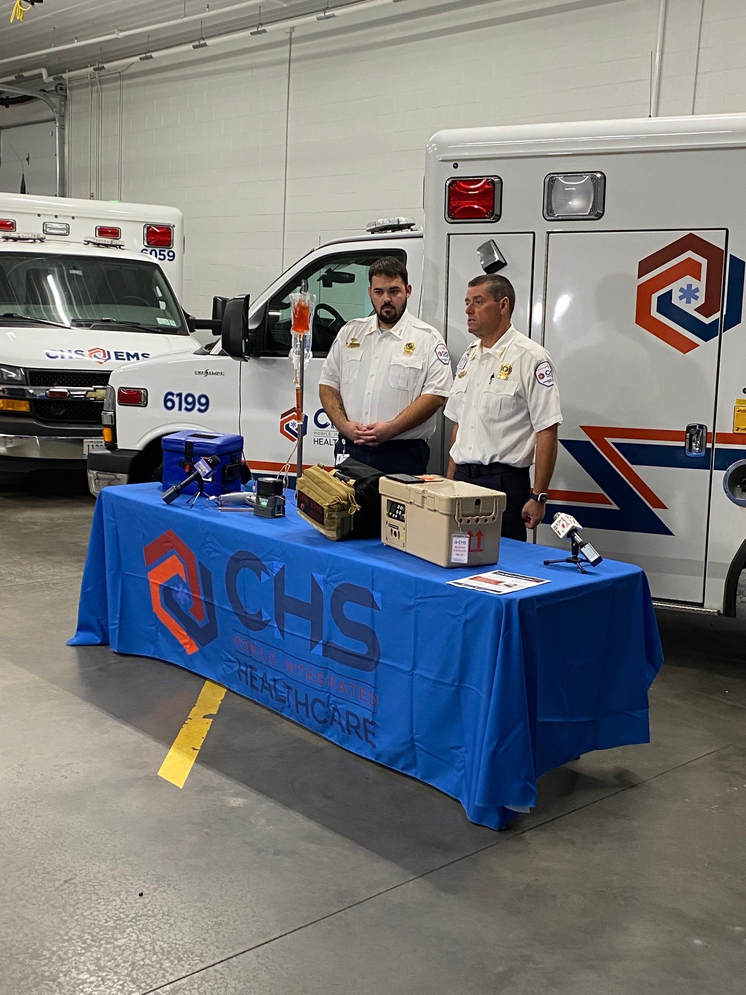 CHS leaders with the blood supplies that enable proper storage of blood products in the field. 
