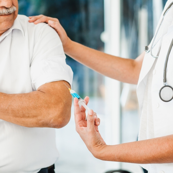 Latino senior vaccinated_GettyImages-1288952725
