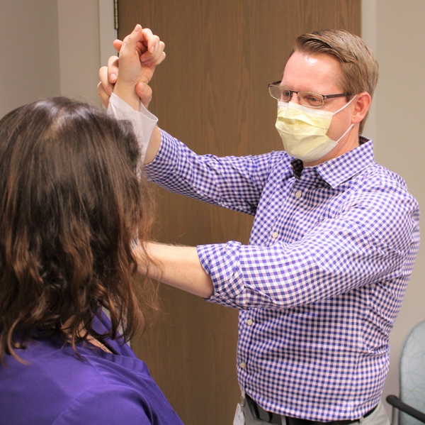 Dr. Kauk with patient