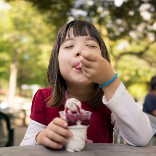 girl eating ice cream happy child