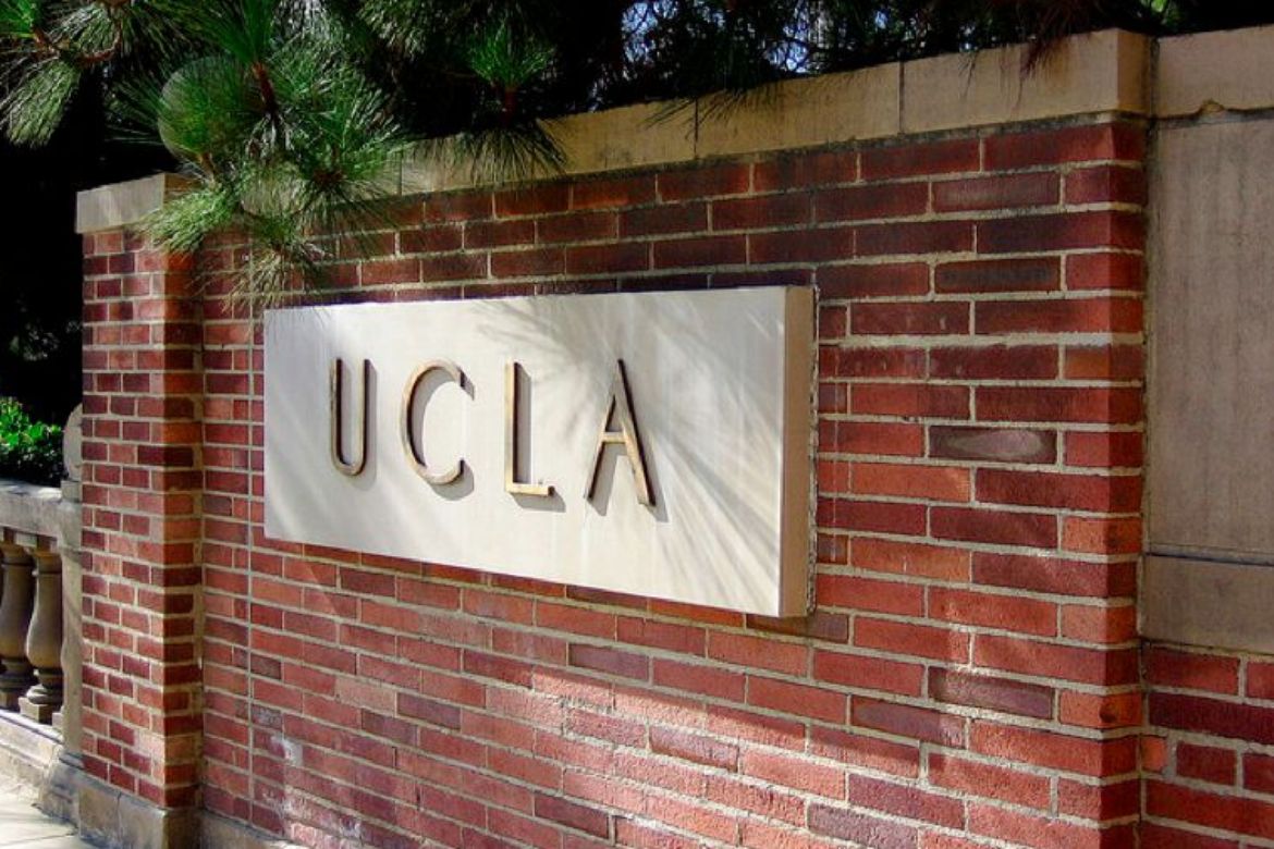 UCLA sign on a brick wall outside