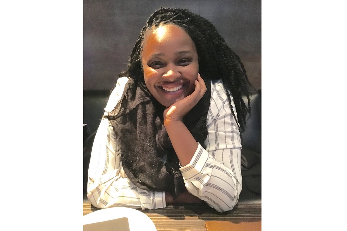 Instructor Dominique Elston smiling for photo.
