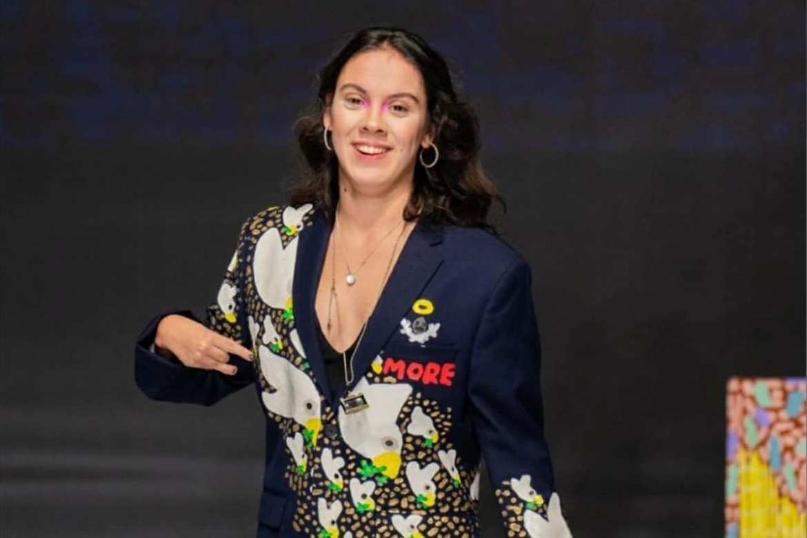Tami Eugenio-Radovic Ferreira smiling for photo.