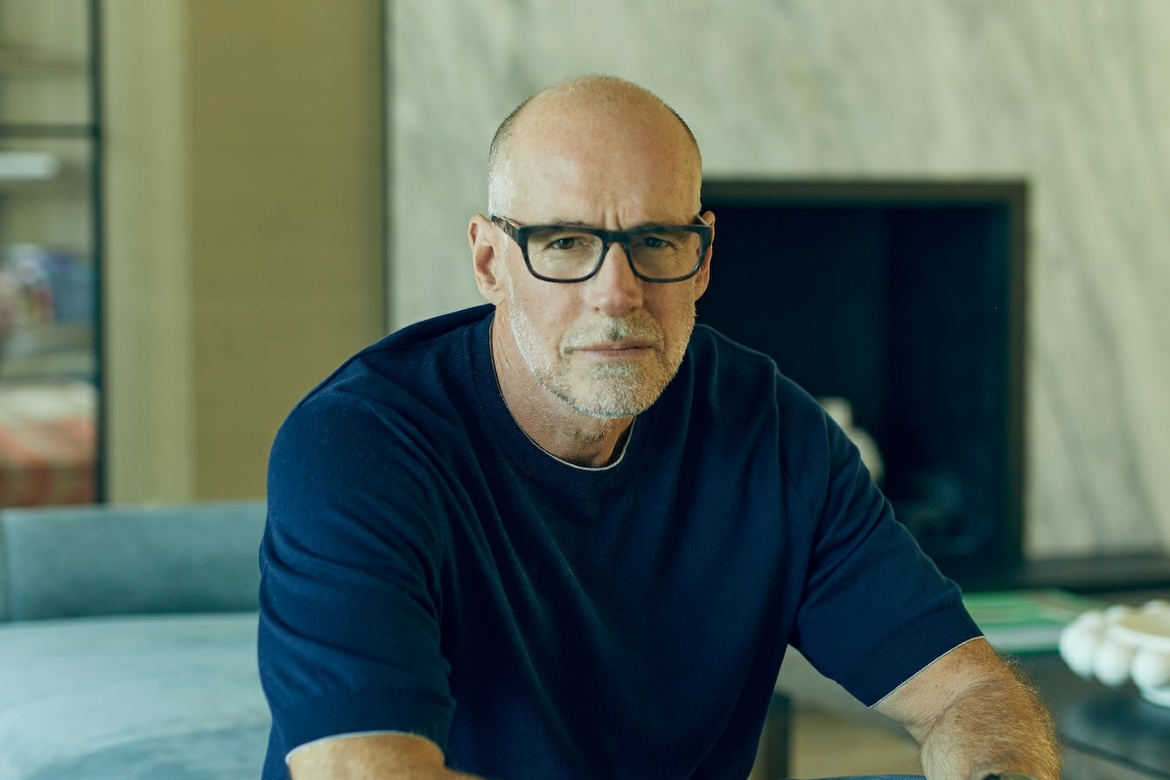 Professor, author and entrepreneur Scott Galloway posing for photo.