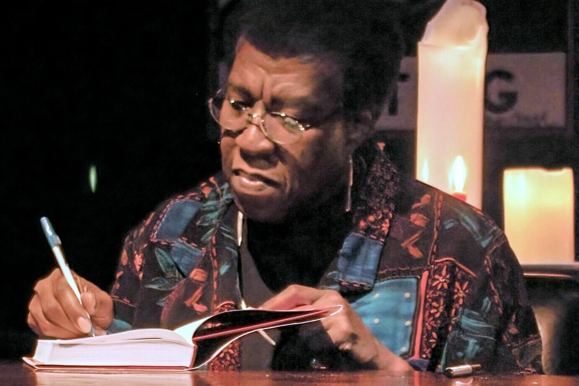 Octavia Butler signing her books.