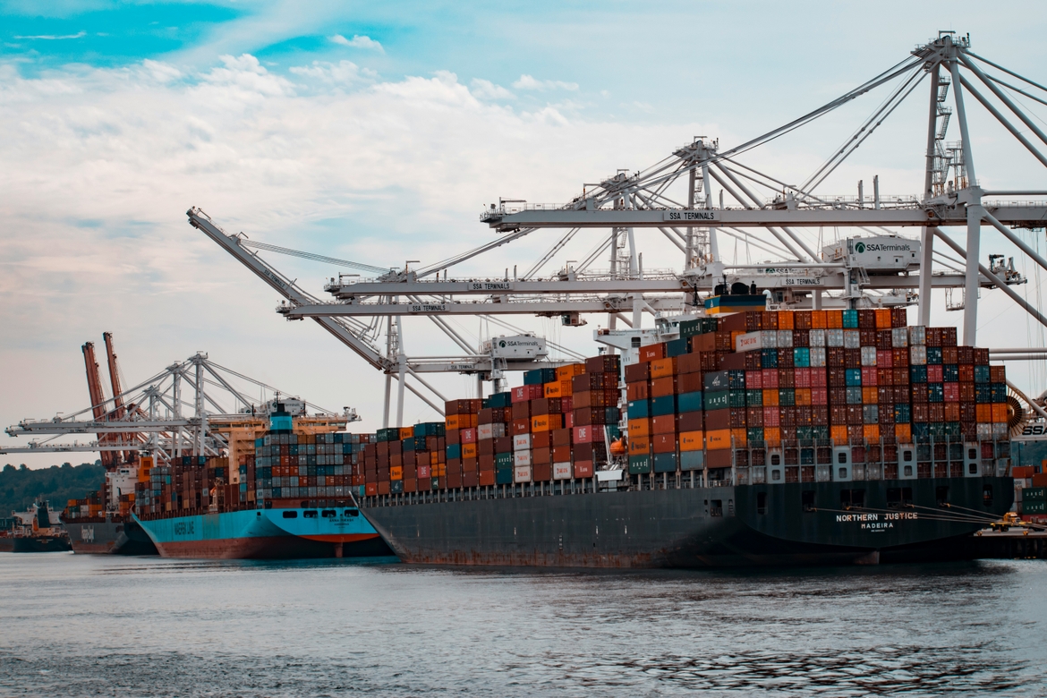 Cargo ships docking at a nearby port