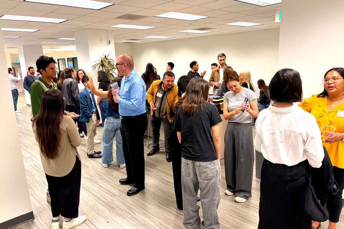 Bruin Network Program participants chat with one another at the UCLA Career Center