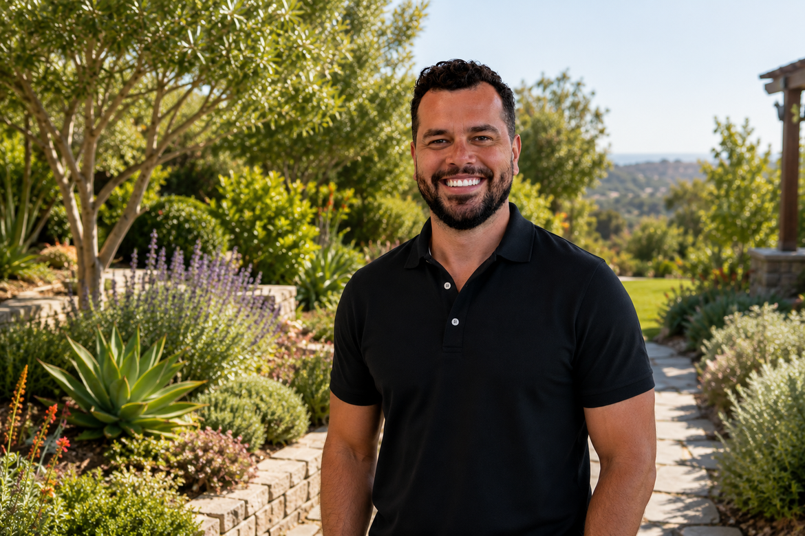 Patrese Winter Calheiros stands in front of a drought tolerant landscape