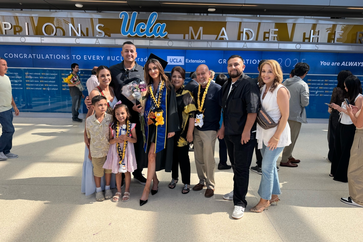 Stephanie Casimiro and her family during UCLA Extension graduation at Pauley Pavilion
