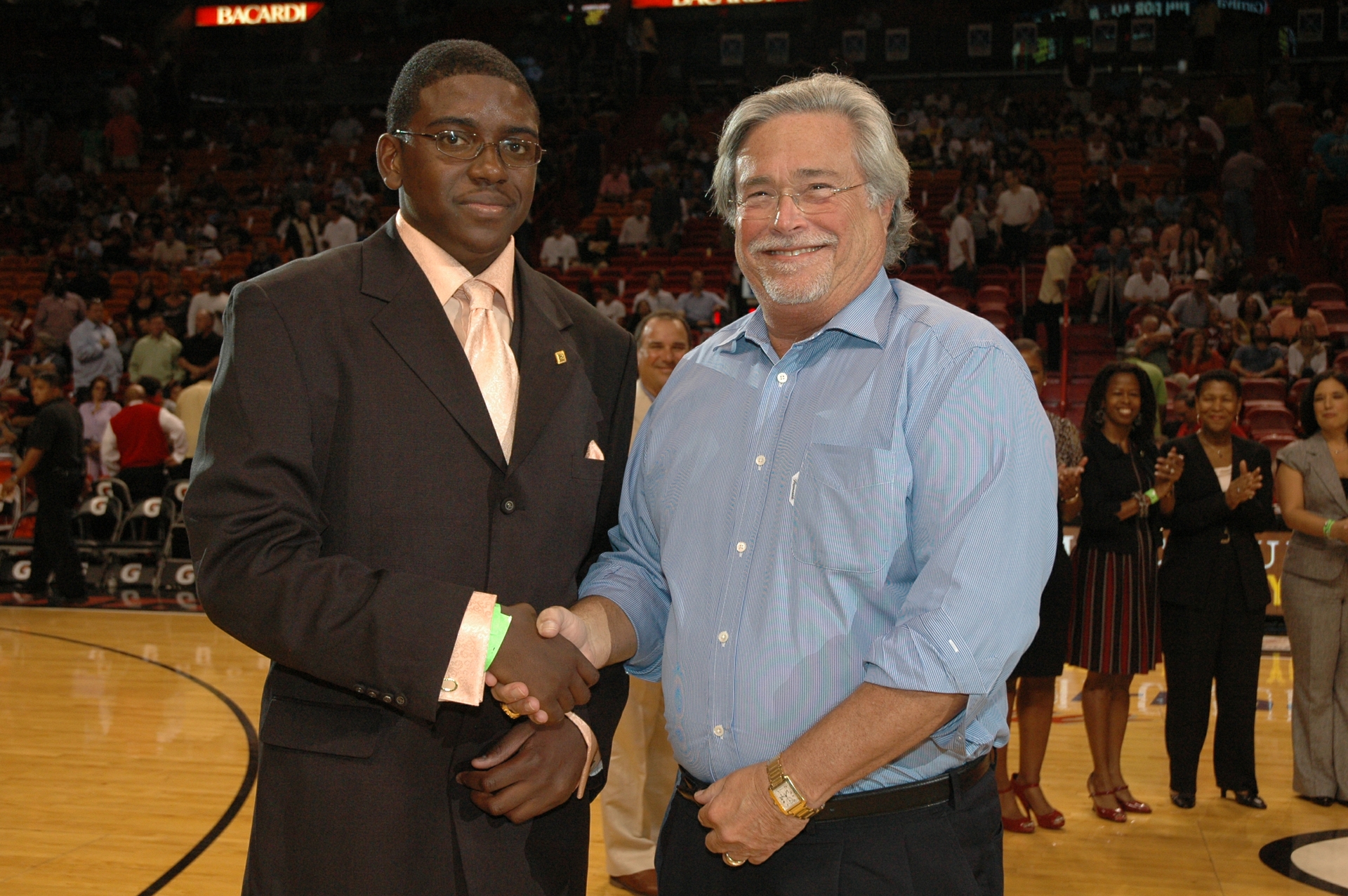 Micky Arison, chairman and CEO of Carnival Corporation & plc and managing general partner of the Miami HEAT, is pictured here at the halftime scholarship presentation.