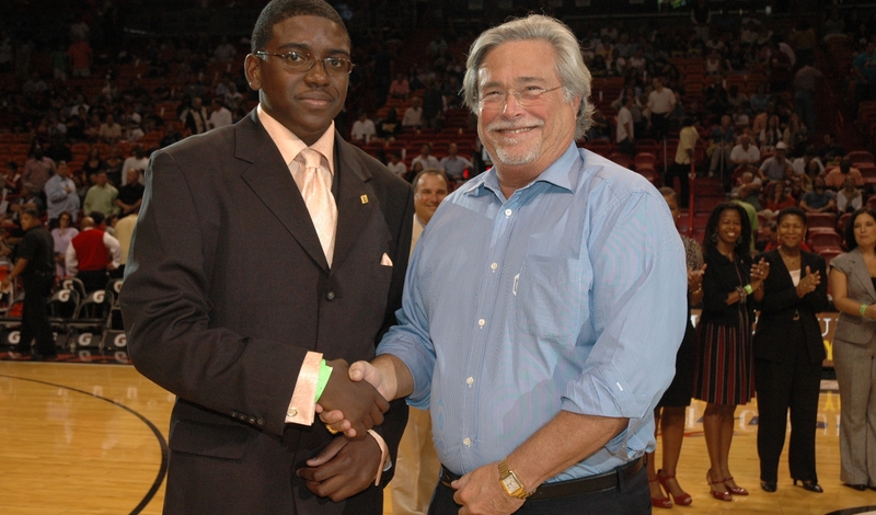 Micky Arison, chairman and CEO of Carnival Corporation & plc and managing general partner of the Miami HEAT, is pictured here at the halftime scholarship presentation.