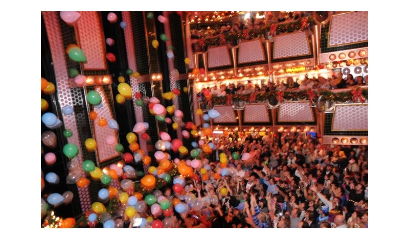 Balloons rained down on guests in the atrium at midnight.