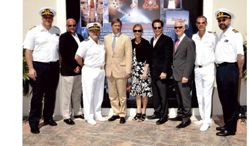 Pictured here at the unveiling of a series of murals at the Grand Turk Cruise Center as part of the island’s Space Exploration Week are (from left): Holland America Eurodam Captain Darin Bowland; Grand Turk Cruise Center General Manager John Young; Carnival MiracleCaptain Vito Giacalone; His Excellency Governor Damian (Ric) Todd; Deputy Director of Kennedy Space Center Janet Petro;  Carnival Corporation VP of Global Port & Destination Group David Candib; Art Perper of Perper Design, Inc.; Carnival Miracl